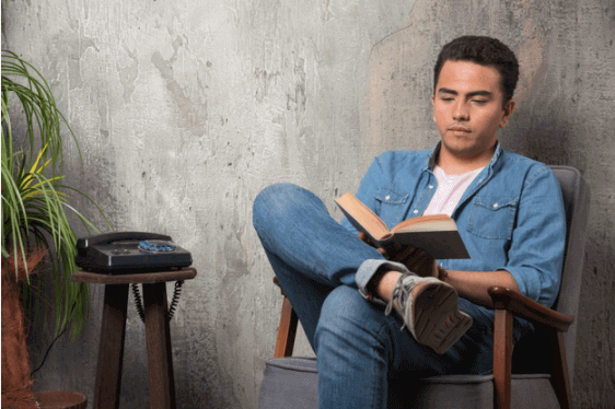 man reading a book success institute australia